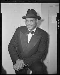 Washington, D.C. Russian war anniversary benefit at the Watergate. Paul Robeson backstage. Sourced from the Library of Congress.