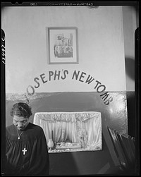 Washington, D.C. A disciple of the St. Martin's Spiritual Church keeping vigil at Saint Joseph's new tomb. Sourced from the Library of Congress.
