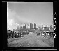 [Untitled photo, possibly related to: Company houses near steel mills. Ensley, Alabama]. Sourced from the Library of Congress.