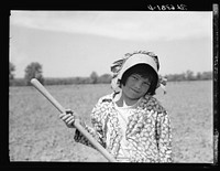[Untitled photo, possibly related to: R.E. Sneed, rehabilitation client and eight year old daughter on cotton cultivator. Near Batesville, Arkansas]. Sourced from the Library of Congress.