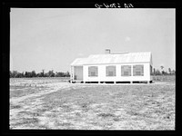 [Untitled photo, possibly related to: Rural Resettlement Administration house with all entrances at one end on Irwinville Farms, Georgia]. Sourced from the Library of Congress.