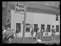 [Untitled photo, possibly related to: Tourists, fresh off the boat from Boston. With only two hours in town, they buy seashells, dinners, trinkets, and rides on the sightseeing bus. Provincetown, Massachusetts]. Sourced from the Library of Congress.
