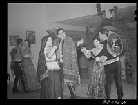 [Untitled photo, possibly related to: Brownsville, Texas. Charro Days fiesta. Dance given by Mexican girls called the Live, Love and Laugh Club, or the Triple L Club]. Sourced from the Library of Congress.