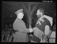 Brownsville, Texas. Charro Days fiesta. A bandido shakes hands with a local military officer. Sourced from the Library of Congress.