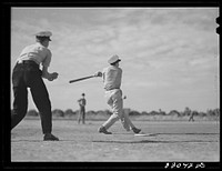 [Untitled photo, possibly related to: Weslaco, Texas. FSA (Farm Security Administration) camp. Baseball game. Saturday afternoon]. Sourced from the Library of Congress.