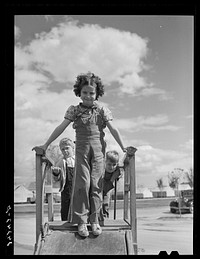 Children on slide. Shafter migrant camp. Shafter, California. Sourced from the Library of Congress.