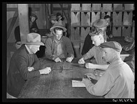 Men in recreation hall. Tulare migrant camp. Visalia, California. Sourced from the Library of Congress.