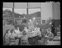 [Untitled photo, possibly related to: Nursery school group drawing pictures. Homestead school, Dailey, West Virginia]. Sourced from the Library of Congress.