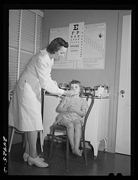 Harlingen, Texas. FSA (Farm Security Administration) camp. Nurse and patient. Sourced from the Library of Congress.
