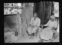 [Untitled photo, possibly related to: es, descendants of former slaves of the Pettway Plantation. They are living under primitive conditions on the plantation. Gees Bend, Alabama]. Sourced from the Library of Congress.