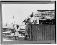 Drawing water from well. Gees Bend, Alabama. Sourced from the Library of Congress.