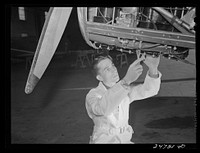 Fort Worth, Texas. Meacham Field. Student working on motor. Sourced from the Library of Congress.