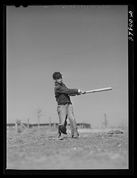 Saturday morning baseball game. FSA (Farm Security Administration) camp, Robstown, Texas. Sourced from the Library of Congress.