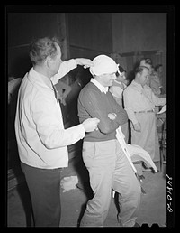 [Untitled photo, possibly related to: First aid class FSA (Farm Security Administration) camp, Robstown, Texas]. Sourced from the Library of Congress.