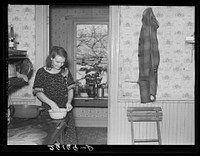 Mrs. Hugh Trumbull in her kitchen. Oswego County, New York. Sourced from the Library of Congress.