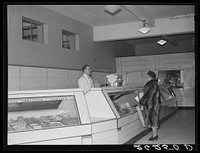 Meat department of cooperative store. Greenbelt, Maryland. Sourced from the Library of Congress.