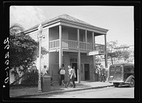 Pepe's coffee shop, where the town's business is transacted. Key West, Florida. Sourced from the Library of Congress.