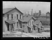 Workers' homes with steel plant in background. Aliquippa, Pennsylvania. Sourced from the Library of Congress.