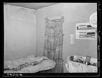 Room in which migratory agricultural workers sleep. Camden County, New Jersey. Sourced from the Library of Congress.