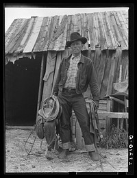 Walter Latta with saddle and bridle. Bozeman, Montana. Sourced from the Library of Congress.