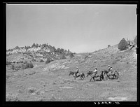 [Untitled photo, possibly related to: Dudes out for a morning ride. Quarter Circle 'U' Ranch, Montana]. Sourced from the Library of Congress.