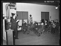 [Untitled photo, possibly related to: Evangelist preaching sermon. Pentecostal church, Cambria, Illinois]. Sourced from the Library of Congress.