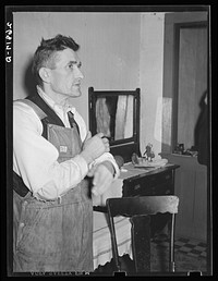 [Untitled photo, possibly related to: Coal miner who is unemployed because of mechanization of coal mine. Bush, Illinois]. Sourced from the Library of Congress.