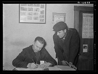 Rehabilitation Administration supervisor with client. Ridgeway, Illinois. Sourced from the Library of Congress.
