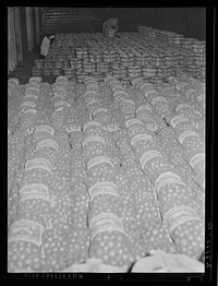 Sacks of onions and baskets of apples at produce market on Pier 29. New York City. Sourced from the Library of Congress.