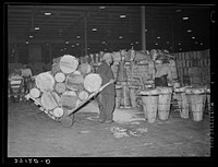 Unloading crates of cabbages at produce market. Pier 29, New York City. Sourced from the Library of Congress.