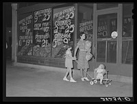 Saturday night shopper. Grundy Center, Iowa. Sourced from the Library of Congress.