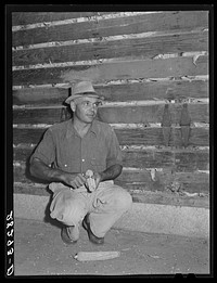 [Untitled photo, possibly related to: Luther Passmore, farmer, with hybrid corn. Polk County, Iowa]. Sourced from the Library of Congress.