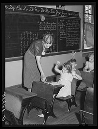 [Untitled photo, possibly related to: Louis Slinker and some of her pupils in one-room schoolhouse in Grundy County, Iowa]. Sourced from the Library of Congress.