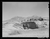 Filling a trench silo. Montrose County, Colorado. Sourced from the Library of Congress.