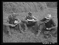 Hired hands eating watermelon. Kimberley farm, Jasper County, Iowa. Sourced from the Library of Congress.