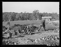 Mining tiff is a dangerous and laborious occupation because tiff mines are never timbered and all mining is done by hand labor. Washington County, Missouri. Sourced from the Library of Congress.