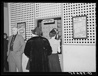 [Untitled photo, possibly related to: Check room at dance hall. Marshalltown, Iowa]. Sourced from the Library of Congress.