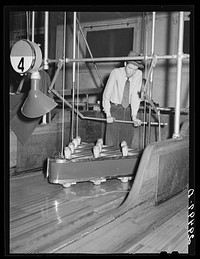 [Untitled photo, possibly related to: Pin boy in bowling alley. Clinton, Indiana]. Sourced from the Library of Congress.