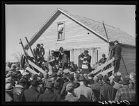 [Untitled photo, possibly related to: Farmers at auction. Zimmerman farm near Hastings, Nebraska]. Sourced from the Library of Congress.