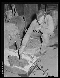 Gold and silver ore as it comes from the mill. El Dorado Canyon, Clark County, Nevada. Sourced from the Library of Congress.