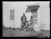 [Untitled photo, possibly related to: In addition to the cooperative profits and wages he receives, Jerry Vardiman has a good house. Osage Farms, Missouri]. Sourced from the Library of Congress.