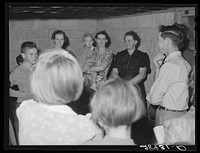 [Untitled photo, possibly related to: "Hiram & Mirandy" game played at Halloween party. Hillview Cooperative, Osage Farms, Missouri]. Sourced from the Library of Congress.