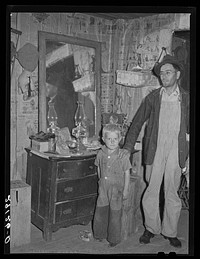 Former tiff miner, now blind, with son. Washington County, Missouri. Sourced from the Library of Congress.