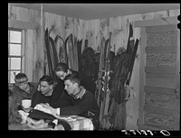 [Untitled photo, possibly related to: Weekend skiers, often from New York, can get warm and dry and refreshments in ski hut built by Clinton Gilbert, farmer in Woodstock, Vermont]. Sourced from the Library of Congress.