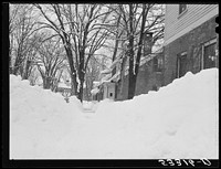 Woodstock, Vermont. Deepest snow in years piled up beside highways and sidewalks on main street. Sourced from the Library of Congress.