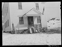 School, with children's sled and skis parked outside. Center Sandwich, New Hampshire. Sourced from the Library of Congress.