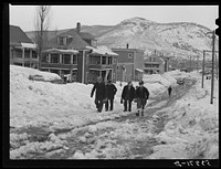 Paper mill workers coming home after work. Berlin, New Hampshire. Sourced from the Library of Congress.