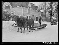 Farmers coming into town with sled. Woodstock, Vermont. Sourced from the Library of Congress.