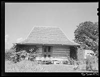 [Untitled photo, possibly related to: Melrose, Natchitoches Parish, Louisiana. Old wash house built by mulattoes, now a part of the John Henry cotton plantation]. Sourced from the Library of Congress.