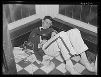 Dawn breaks after a cotton carnival ball. Entrance to a hotel lobby. Memphis, Tennessee. Sourced from the Library of Congress.